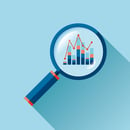 magnify glass highlighting data analytics